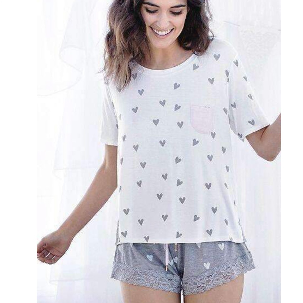 Size Small never worn tee and shortie Hearts Set